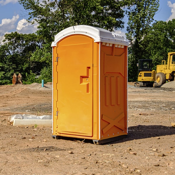 what is the cost difference between standard and deluxe portable restroom rentals in Rombauer MO